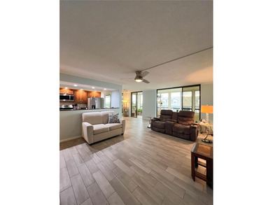 Welcome to this exquisitely updated 3-bedroom, 2-bath top-floor on Feather Sound Country Club in Florida - for sale on GolfHomes.com, golf home, golf lot