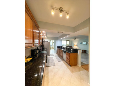 Welcome to this exquisitely updated 3-bedroom, 2-bath top-floor on Feather Sound Country Club in Florida - for sale on GolfHomes.com, golf home, golf lot