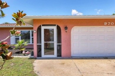 Flamingo house. Charming Floridian home, meticulously maintained on Jacaranda West Country Club in Florida - for sale on GolfHomes.com, golf home, golf lot