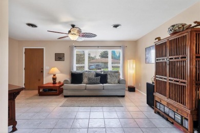 Flamingo house. Charming Floridian home, meticulously maintained on Jacaranda West Country Club in Florida - for sale on GolfHomes.com, golf home, golf lot