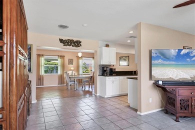 Flamingo house. Charming Floridian home, meticulously maintained on Jacaranda West Country Club in Florida - for sale on GolfHomes.com, golf home, golf lot