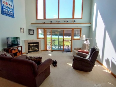 Stunning End-Unit Condo on Lake Lancer -- A Rare Lakeside Gem on Lakeside Golf Course in Michigan - for sale on GolfHomes.com, golf home, golf lot