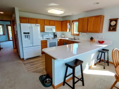 Stunning End-Unit Condo on Lake Lancer -- A Rare Lakeside Gem on Lakeside Golf Course in Michigan - for sale on GolfHomes.com, golf home, golf lot