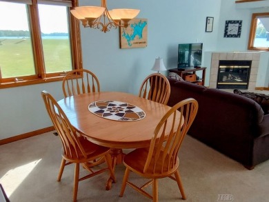 Stunning End-Unit Condo on Lake Lancer -- A Rare Lakeside Gem on Lakeside Golf Course in Michigan - for sale on GolfHomes.com, golf home, golf lot