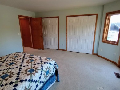 Stunning End-Unit Condo on Lake Lancer -- A Rare Lakeside Gem on Lakeside Golf Course in Michigan - for sale on GolfHomes.com, golf home, golf lot