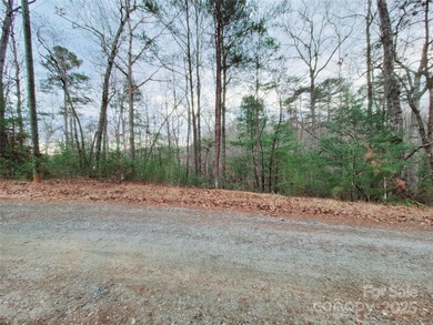 Tucked inside the gated community of Riverbend at Lake Lure on Lake Lure Municipal Golf Course in North Carolina - for sale on GolfHomes.com, golf home, golf lot