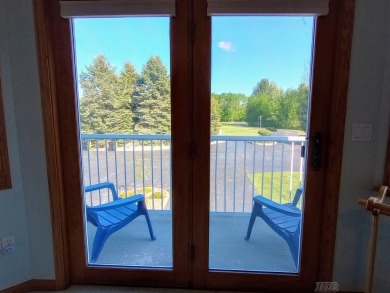 Stunning End-Unit Condo on Lake Lancer -- A Rare Lakeside Gem on Lakeside Golf Course in Michigan - for sale on GolfHomes.com, golf home, golf lot