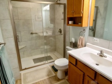 Stunning End-Unit Condo on Lake Lancer -- A Rare Lakeside Gem on Lakeside Golf Course in Michigan - for sale on GolfHomes.com, golf home, golf lot