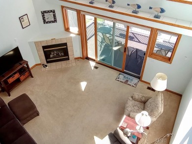 Stunning End-Unit Condo on Lake Lancer -- A Rare Lakeside Gem on Lakeside Golf Course in Michigan - for sale on GolfHomes.com, golf home, golf lot