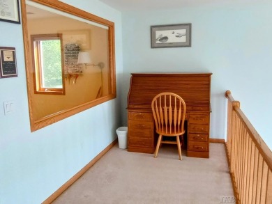 Stunning End-Unit Condo on Lake Lancer -- A Rare Lakeside Gem on Lakeside Golf Course in Michigan - for sale on GolfHomes.com, golf home, golf lot