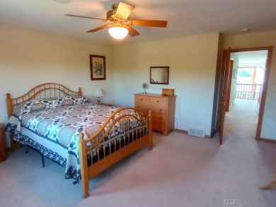 Stunning End-Unit Condo on Lake Lancer -- A Rare Lakeside Gem on Lakeside Golf Course in Michigan - for sale on GolfHomes.com, golf home, golf lot