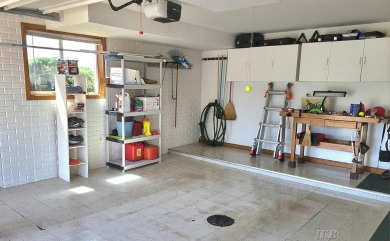 Stunning End-Unit Condo on Lake Lancer -- A Rare Lakeside Gem on Lakeside Golf Course in Michigan - for sale on GolfHomes.com, golf home, golf lot