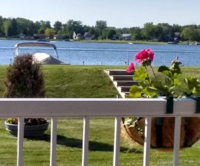 Stunning End-Unit Condo on Lake Lancer -- A Rare Lakeside Gem on Lakeside Golf Course in Michigan - for sale on GolfHomes.com, golf home, golf lot