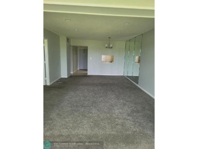 SPACIOUS 2 BEDROOM 2 BATHROOM CONDO UNIT WITH BEAUTIFUL GOLF on Oriole Golf and Tennis Club in Florida - for sale on GolfHomes.com, golf home, golf lot