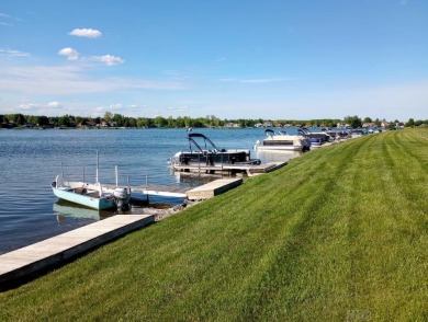 Stunning End-Unit Condo on Lake Lancer -- A Rare Lakeside Gem on Lakeside Golf Course in Michigan - for sale on GolfHomes.com, golf home, golf lot