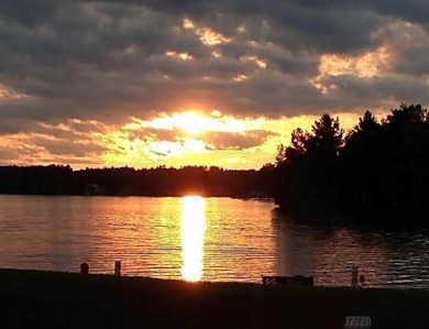 Stunning End-Unit Condo on Lake Lancer -- A Rare Lakeside Gem on Lakeside Golf Course in Michigan - for sale on GolfHomes.com, golf home, golf lot