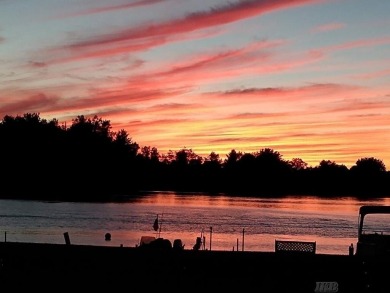Stunning End-Unit Condo on Lake Lancer -- A Rare Lakeside Gem on Lakeside Golf Course in Michigan - for sale on GolfHomes.com, golf home, golf lot