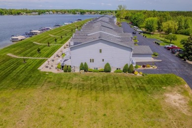 Stunning End-Unit Condo on Lake Lancer -- A Rare Lakeside Gem on Lakeside Golf Course in Michigan - for sale on GolfHomes.com, golf home, golf lot