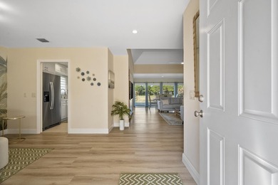 Live just steps from all that Mariner Sands has to offer in this on  in Florida - for sale on GolfHomes.com, golf home, golf lot