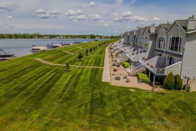 Stunning End-Unit Condo on Lake Lancer -- A Rare Lakeside Gem on Lakeside Golf Course in Michigan - for sale on GolfHomes.com, golf home, golf lot