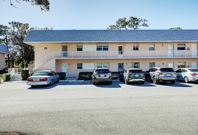 Freshly painted 2/2 second floor condo in the 55+ community of on The Little Club in Florida - for sale on GolfHomes.com, golf home, golf lot