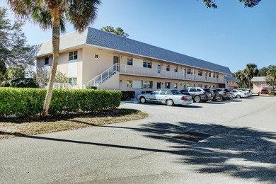 Freshly painted 2/1.5 second floor condo in the 55+ community of on The Little Club in Florida - for sale on GolfHomes.com, golf home, golf lot