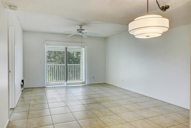 Freshly painted 2/2 second floor condo in the 55+ community of on The Little Club in Florida - for sale on GolfHomes.com, golf home, golf lot