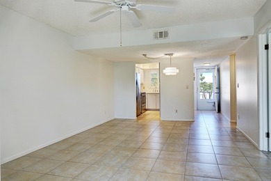 Freshly painted 2/2 second floor condo in the 55+ community of on The Little Club in Florida - for sale on GolfHomes.com, golf home, golf lot