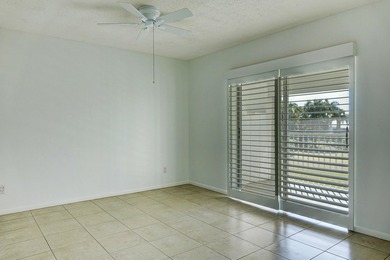 Freshly painted 2/1.5 second floor condo in the 55+ community of on The Little Club in Florida - for sale on GolfHomes.com, golf home, golf lot