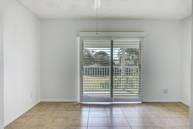 Freshly painted 2/1.5 second floor condo in the 55+ community of on The Little Club in Florida - for sale on GolfHomes.com, golf home, golf lot