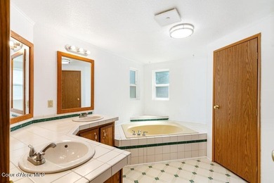 Tucked into a quiet Hayden community, this newly updated on Hayden Lake Country Club in Idaho - for sale on GolfHomes.com, golf home, golf lot