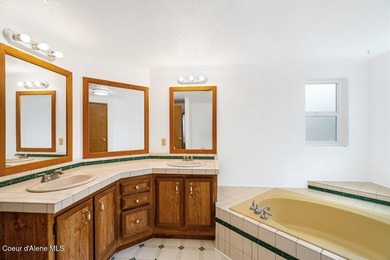 Tucked into a quiet Hayden community, this newly updated on Hayden Lake Country Club in Idaho - for sale on GolfHomes.com, golf home, golf lot