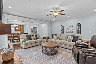 Tucked inside the Village of Highlands South, this 4-bedroom on Highland Oaks Golf Course in Alabama - for sale on GolfHomes.com, golf home, golf lot