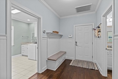 Tucked inside the Village of Highlands South, this 4-bedroom on Highland Oaks Golf Course in Alabama - for sale on GolfHomes.com, golf home, golf lot