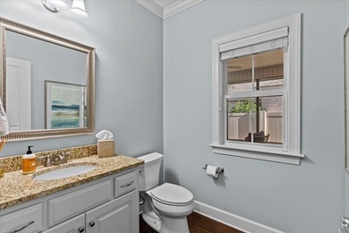 Tucked inside the Village of Highlands South, this 4-bedroom on Highland Oaks Golf Course in Alabama - for sale on GolfHomes.com, golf home, golf lot