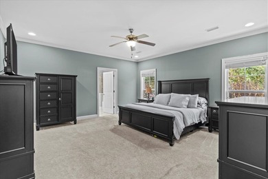 Tucked inside the Village of Highlands South, this 4-bedroom on Highland Oaks Golf Course in Alabama - for sale on GolfHomes.com, golf home, golf lot