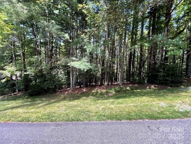 This great lot in Connestee Falls offers easy building on a on Connestee Falls Golf Club in North Carolina - for sale on GolfHomes.com, golf home, golf lot
