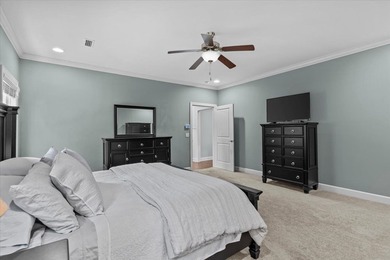 Tucked inside the Village of Highlands South, this 4-bedroom on Highland Oaks Golf Course in Alabama - for sale on GolfHomes.com, golf home, golf lot