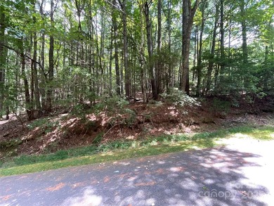 This great lot in Connestee Falls offers easy building on a on Connestee Falls Golf Club in North Carolina - for sale on GolfHomes.com, golf home, golf lot