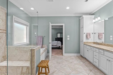 Tucked inside the Village of Highlands South, this 4-bedroom on Highland Oaks Golf Course in Alabama - for sale on GolfHomes.com, golf home, golf lot