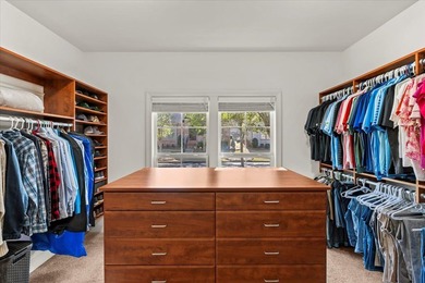 Tucked inside the Village of Highlands South, this 4-bedroom on Highland Oaks Golf Course in Alabama - for sale on GolfHomes.com, golf home, golf lot