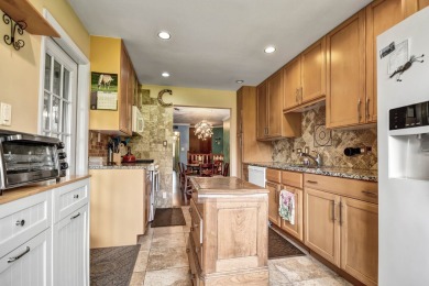 Carefree, resort-style living awaits in this secure, top-floor on Oak Hills Country Club in Illinois - for sale on GolfHomes.com, golf home, golf lot