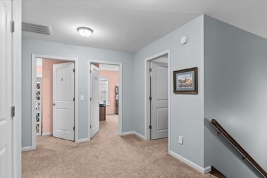 Tucked inside the Village of Highlands South, this 4-bedroom on Highland Oaks Golf Course in Alabama - for sale on GolfHomes.com, golf home, golf lot