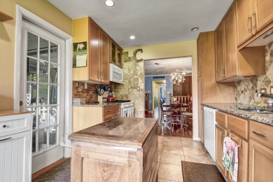 Carefree, resort-style living awaits in this secure, top-floor on Oak Hills Country Club in Illinois - for sale on GolfHomes.com, golf home, golf lot
