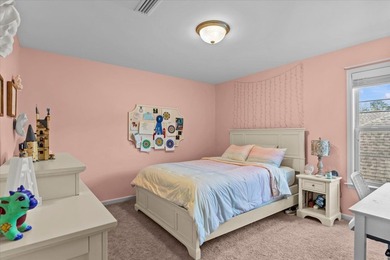 Tucked inside the Village of Highlands South, this 4-bedroom on Highland Oaks Golf Course in Alabama - for sale on GolfHomes.com, golf home, golf lot