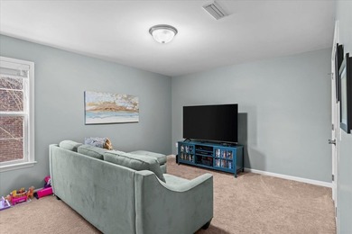 Tucked inside the Village of Highlands South, this 4-bedroom on Highland Oaks Golf Course in Alabama - for sale on GolfHomes.com, golf home, golf lot