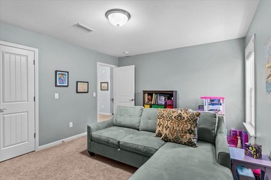 Tucked inside the Village of Highlands South, this 4-bedroom on Highland Oaks Golf Course in Alabama - for sale on GolfHomes.com, golf home, golf lot