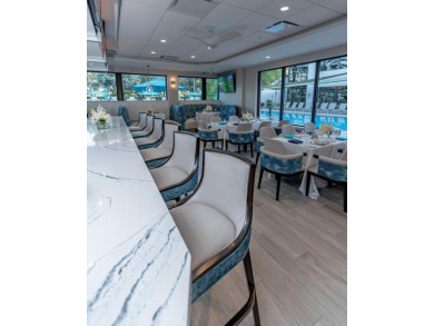 This impeccably maintained 2-bedroom, 2-bathroom condo offers a on Gleneagles Golf and Country Club in Florida - for sale on GolfHomes.com, golf home, golf lot