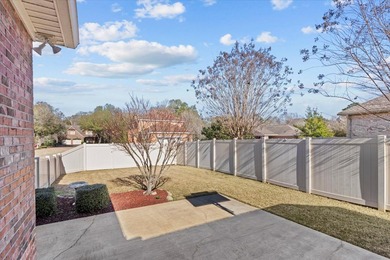 Tucked inside the Village of Highlands South, this 4-bedroom on Highland Oaks Golf Course in Alabama - for sale on GolfHomes.com, golf home, golf lot