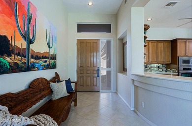 This stunning Edmunds home sits on a superior south facing golf on Legend Trail Golf Club in Arizona - for sale on GolfHomes.com, golf home, golf lot